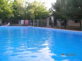 piscina con solarium